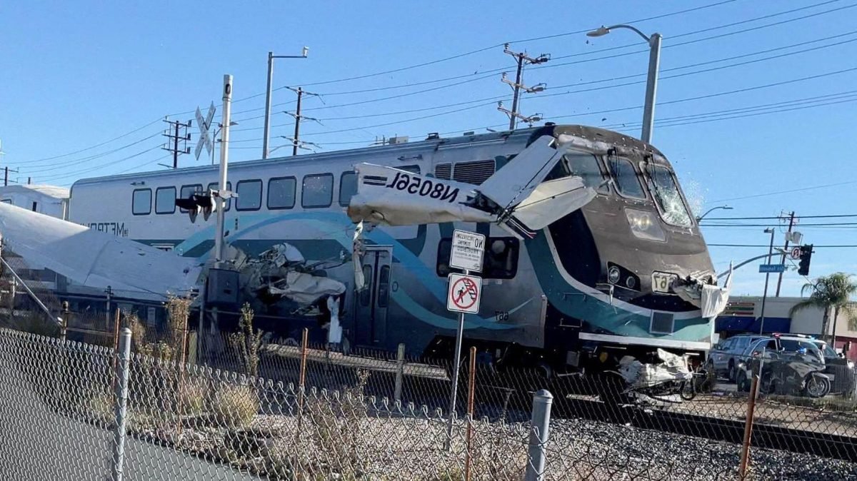 Plane hit by train after crashing on train tracks in California