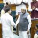 Modi, Rahul Gandhi shake hands in rare gesture