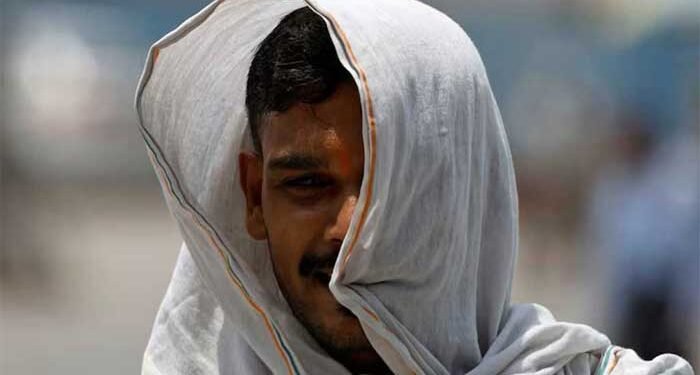 Indian heatwaves, floods kill 11, with four buried alive