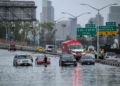 Severe Flooding in New York City: Semi-Truck and Numerous Vehicles Trapped on Queens Highway